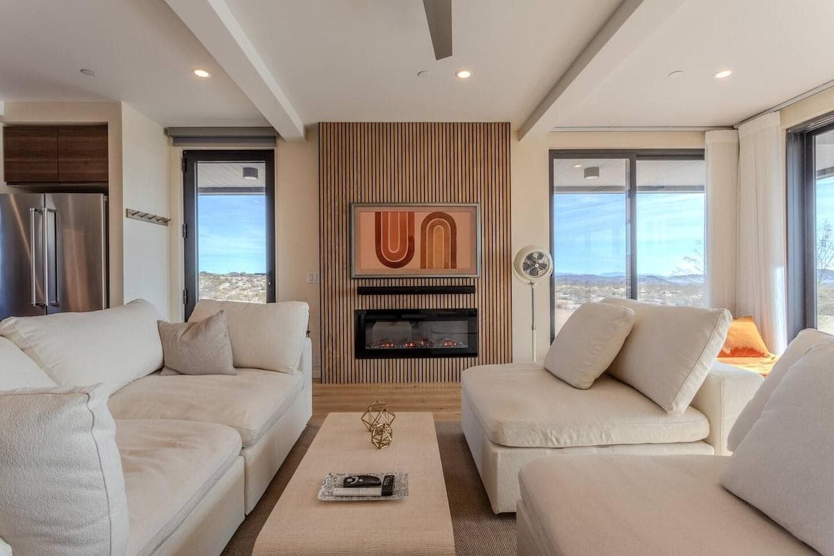 Snuggle up by the warm fireplace on chilly evenings, perfect for relaxing with a movie or enjoying a quiet night in. The ideal setting for comfort and relaxation during the colder months.